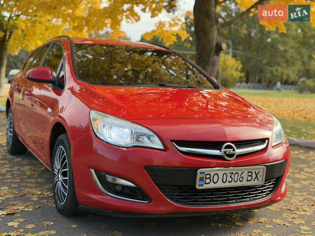 Опель Астра 2013 в Ровно на Automoto.ua Красный Опель Астра, объемом двигателя 1.7 л и пробегом 240 тыс. км за 6350 $, фото 9 на Automoto.ua