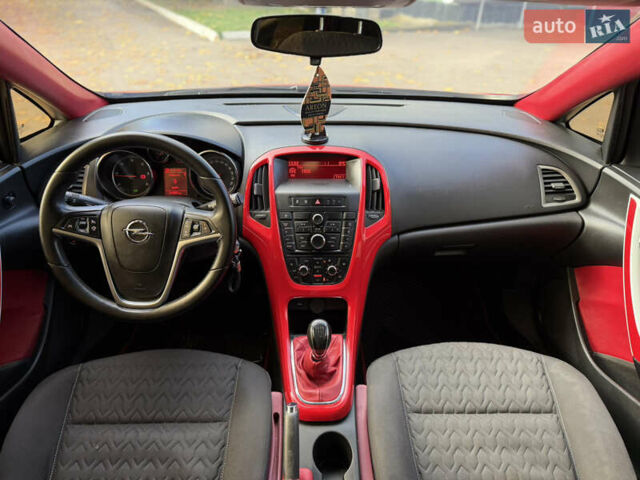 Опель Астра 2013 в Ровно на Automoto.ua Красный Опель Астра, объемом двигателя 1.7 л и пробегом 240 тыс. км за 6350 $, фото 53 на Automoto.ua