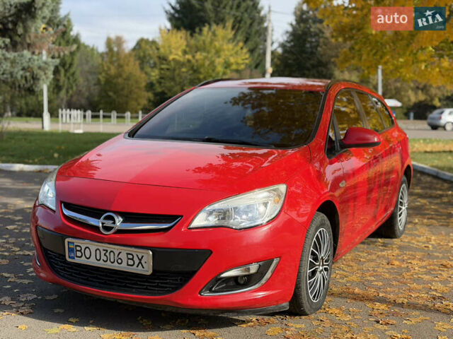 Опель Астра 2013 в Ровно на Automoto.ua Красный Опель Астра, объемом двигателя 1.7 л и пробегом 240 тыс. км за 6350 $, фото 7 на Automoto.ua