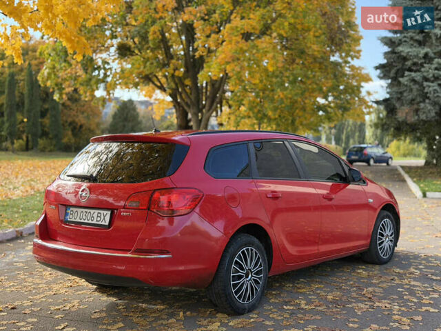 Опель Астра 2013 в Ровно на Automoto.ua Красный Опель Астра, объемом двигателя 1.7 л и пробегом 240 тыс. км за 5700 $, фото 26 на Automoto.ua