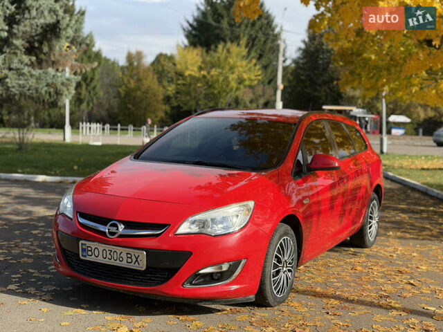 Опель Астра 2013 в Ровно на Automoto.ua Красный Опель Астра, объемом двигателя 1.7 л и пробегом 240 тыс. км за 6350 $, фото 3 на Automoto.ua