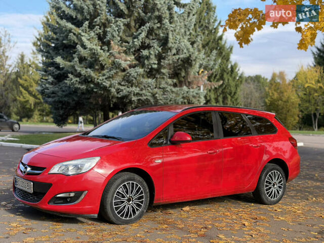 Опель Астра 2013 в Ровно на Automoto.ua Красный Опель Астра, объемом двигателя 1.7 л и пробегом 240 тыс. км за 6350 $, фото 4 на Automoto.ua