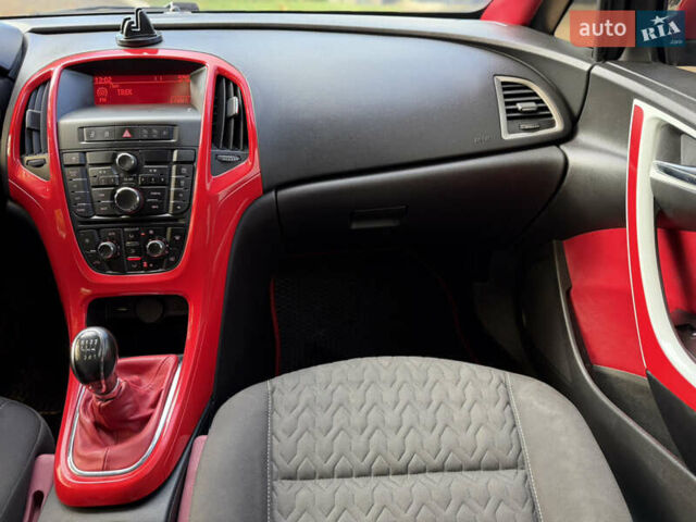 Опель Астра 2013 в Ровно на Automoto.ua Красный Опель Астра, объемом двигателя 1.7 л и пробегом 240 тыс. км за 6350 $, фото 55 на Automoto.ua