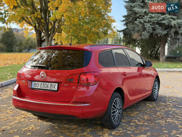 Опель Астра 2013 в Ровно на Automoto.ua Красный Опель Астра, объемом двигателя 1.7 л и пробегом 240 тыс. км за 6350 $, фото 29 на Automoto.ua