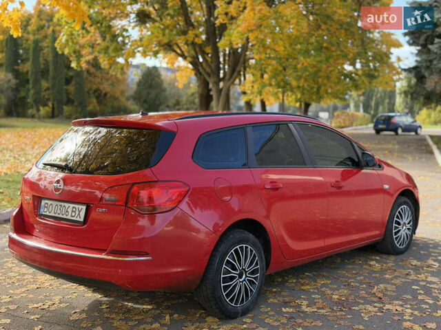 Опель Астра 2013 в Ровно на Automoto.ua Красный Опель Астра, объемом двигателя 1.7 л и пробегом 240 тыс. км за 6350 $, фото 26 на Automoto.ua