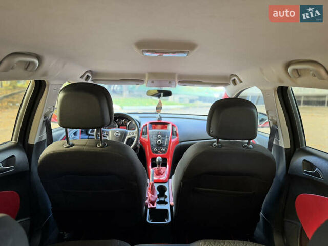 Опель Астра 2013 в Ровно на Automoto.ua Красный Опель Астра, объемом двигателя 1.7 л и пробегом 240 тыс. км за 5700 $, фото 38 на Automoto.ua