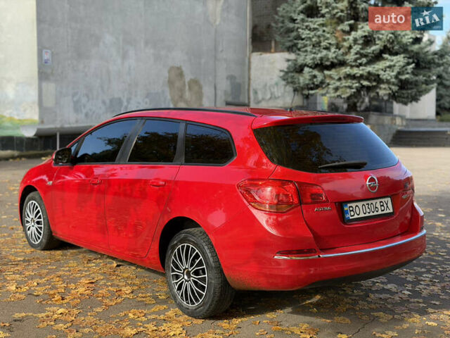 Опель Астра 2013 в Ровно на Automoto.ua Красный Опель Астра, объемом двигателя 1.7 л и пробегом 240 тыс. км за 5700 $, фото 24 на Automoto.ua