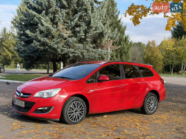Опель Астра 2013 в Ровно на Automoto.ua Красный Опель Астра, объемом двигателя 1.7 л и пробегом 240 тыс. км за 6350 $, фото 33 на Automoto.ua
