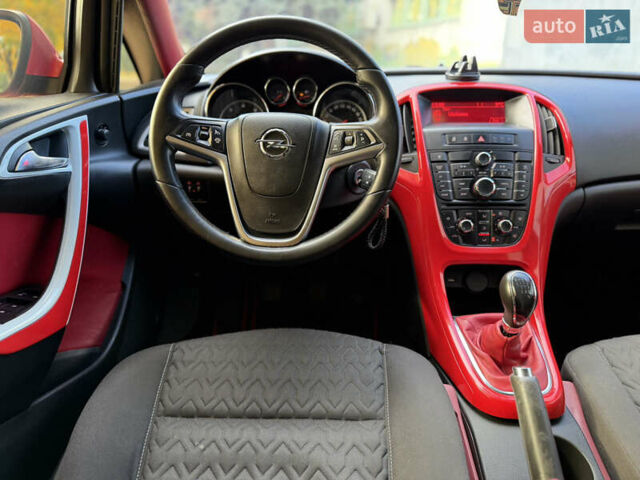 Опель Астра 2013 в Ровно на Automoto.ua Красный Опель Астра, объемом двигателя 1.7 л и пробегом 240 тыс. км за 6350 $, фото 49 на Automoto.ua