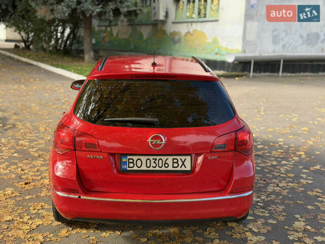 Опель Астра 2013 в Ровно на Automoto.ua Красный Опель Астра, объемом двигателя 1.7 л и пробегом 240 тыс. км за 5700 $, фото 34 на Automoto.ua