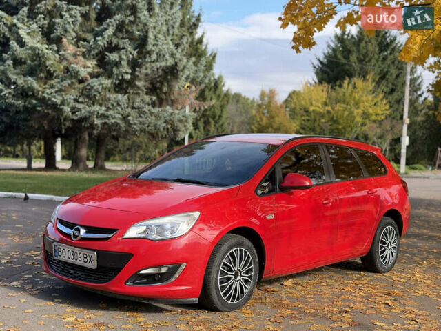 Опель Астра 2013 в Ровно на Automoto.ua Красный Опель Астра, объемом двигателя 1.7 л и пробегом 240 тыс. км за 5700 $, фото 4 на Automoto.ua