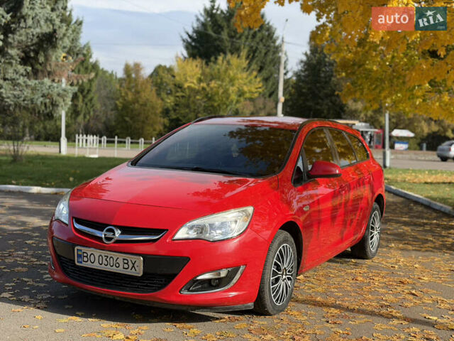 Опель Астра 2013 в Ровно на Automoto.ua Красный Опель Астра, объемом двигателя 1.7 л и пробегом 240 тыс. км за 5700 $, фото 6 на Automoto.ua