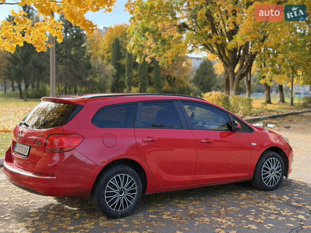 Опель Астра 2013 в Ровно на Automoto.ua Красный Опель Астра, объемом двигателя 1.7 л и пробегом 240 тыс. км за 5700 $, фото 32 на Automoto.ua