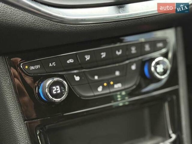 Красный Опель Астра, объемом двигателя 1.5 л и пробегом 174 тыс. км за 15300 $, фото 21 на Automoto.ua