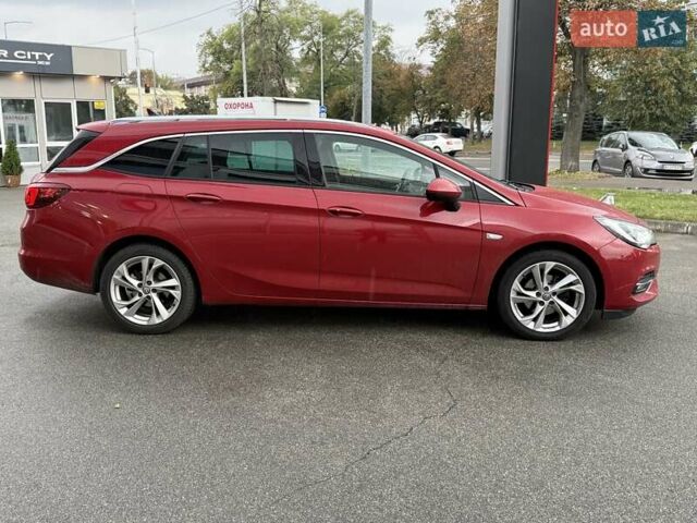 Красный Опель Астра, объемом двигателя 1.5 л и пробегом 174 тыс. км за 15300 $, фото 7 на Automoto.ua