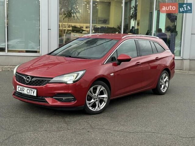 Красный Опель Астра, объемом двигателя 1.5 л и пробегом 174 тыс. км за 15300 $, фото 2 на Automoto.ua