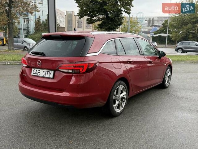 Красный Опель Астра, объемом двигателя 1.5 л и пробегом 174 тыс. км за 15300 $, фото 6 на Automoto.ua