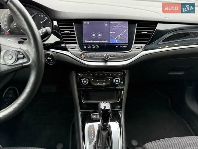 Красный Опель Астра, объемом двигателя 1.5 л и пробегом 174 тыс. км за 15300 $, фото 19 на Automoto.ua