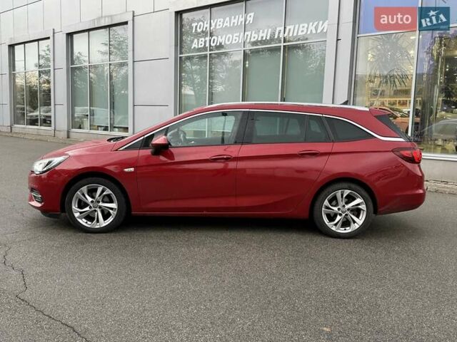 Красный Опель Астра, объемом двигателя 1.5 л и пробегом 174 тыс. км за 15300 $, фото 3 на Automoto.ua