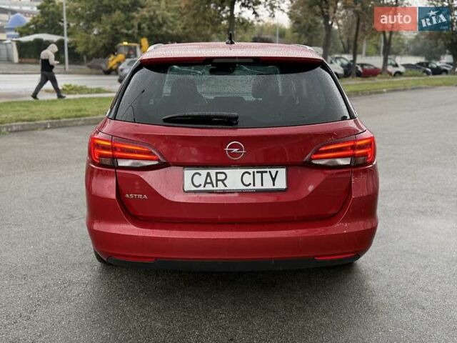 Красный Опель Астра, объемом двигателя 1.5 л и пробегом 174 тыс. км за 15300 $, фото 5 на Automoto.ua