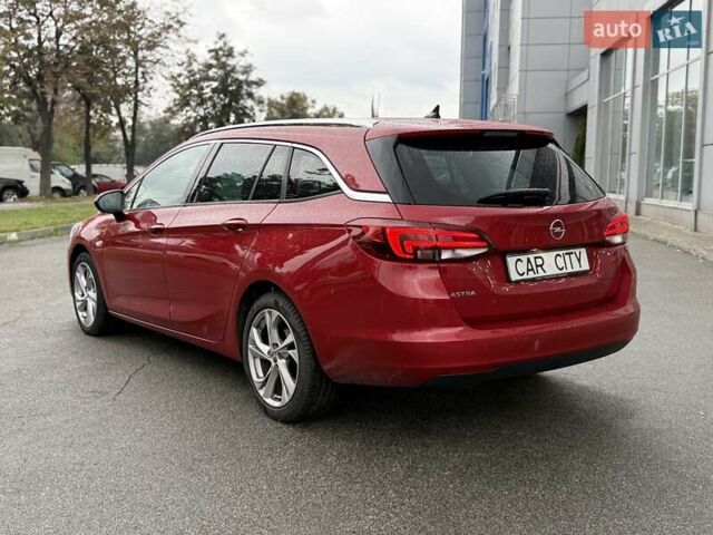 Красный Опель Астра, объемом двигателя 1.5 л и пробегом 174 тыс. км за 15300 $, фото 4 на Automoto.ua