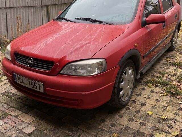 Красный Опель Астра, объемом двигателя 1.4 л и пробегом 249 тыс. км за 1500 $, фото 1 на Automoto.ua