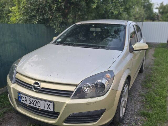 Желтый Опель Астра, объемом двигателя 1.7 л и пробегом 390 тыс. км за 4200 $, фото 1 на Automoto.ua