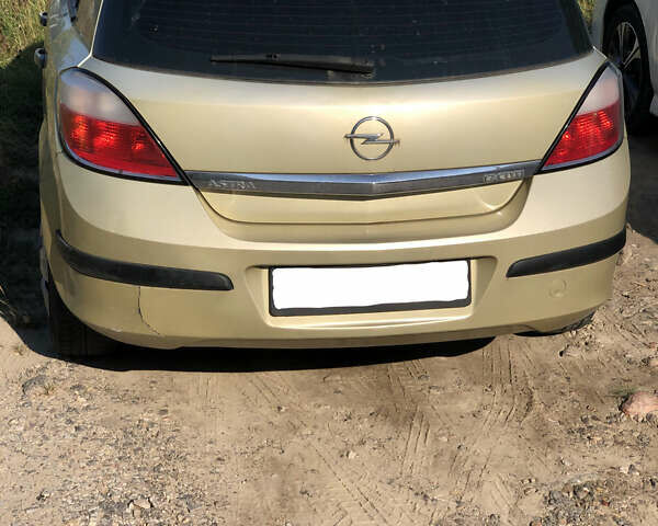 Желтый Опель Астра, объемом двигателя 1.7 л и пробегом 185 тыс. км за 4000 $, фото 2 на Automoto.ua