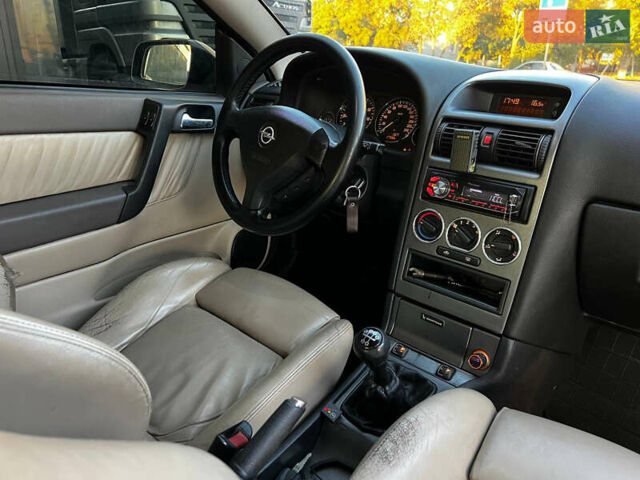 Желтый Опель Астра, объемом двигателя 1.8 л и пробегом 280 тыс. км за 2849 $, фото 8 на Automoto.ua
