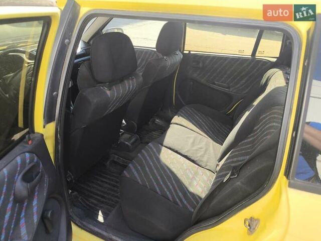 Желтый Опель Астра, объемом двигателя 1.8 л и пробегом 300 тыс. км за 1100 $, фото 10 на Automoto.ua