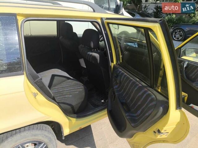 Желтый Опель Астра, объемом двигателя 1.8 л и пробегом 300 тыс. км за 1100 $, фото 12 на Automoto.ua