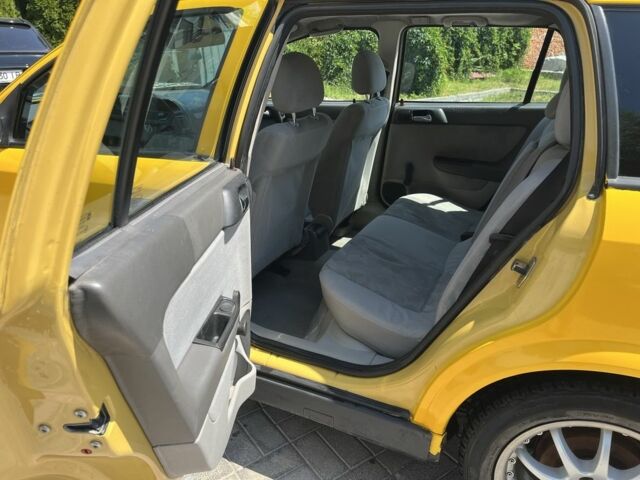 Жовтий Опель Астра, об'ємом двигуна 1.2 л та пробігом 220 тис. км за 2200 $, фото 5 на Automoto.ua