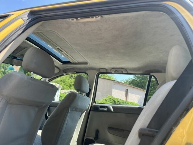 Жовтий Опель Астра, об'ємом двигуна 1.2 л та пробігом 220 тис. км за 2200 $, фото 10 на Automoto.ua