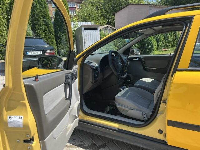 Жовтий Опель Астра, об'ємом двигуна 1.2 л та пробігом 220 тис. км за 2200 $, фото 13 на Automoto.ua