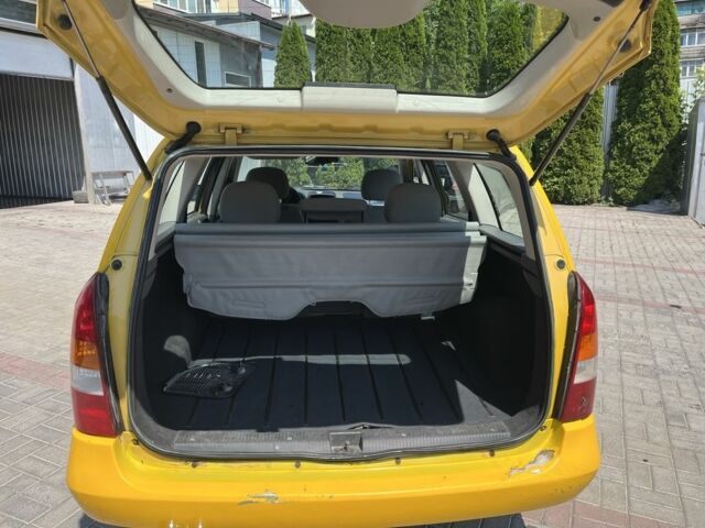 Жовтий Опель Астра, об'ємом двигуна 1.2 л та пробігом 220 тис. км за 2200 $, фото 6 на Automoto.ua