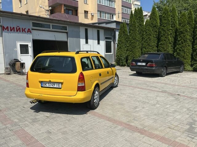 Жовтий Опель Астра, об'ємом двигуна 1.2 л та пробігом 220 тис. км за 2200 $, фото 3 на Automoto.ua