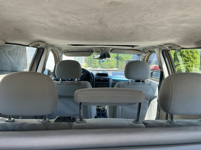 Жовтий Опель Астра, об'ємом двигуна 1.2 л та пробігом 220 тис. км за 2200 $, фото 7 на Automoto.ua