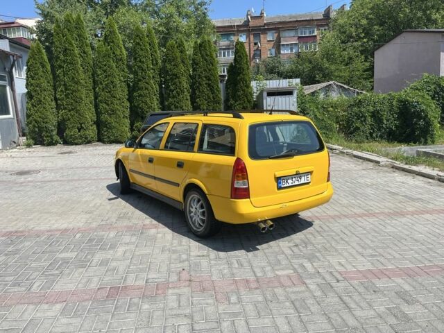 Жовтий Опель Астра, об'ємом двигуна 1.2 л та пробігом 220 тис. км за 2200 $, фото 2 на Automoto.ua