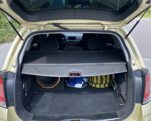 Желтый Опель Астра, объемом двигателя 1.8 л и пробегом 272 тыс. км за 4800 $, фото 13 на Automoto.ua