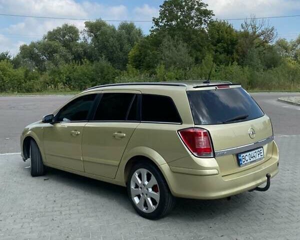 Желтый Опель Астра, объемом двигателя 1.8 л и пробегом 272 тыс. км за 4800 $, фото 5 на Automoto.ua