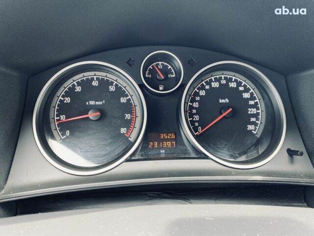 Серый Опель Астра, объемом двигателя 1.8 л и пробегом 231 тыс. км за 5400 $, фото 19 на Automoto.ua