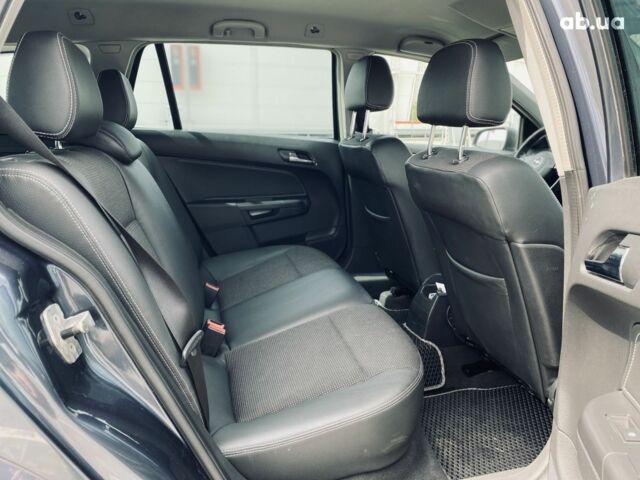 Серый Опель Астра, объемом двигателя 1.8 л и пробегом 231 тыс. км за 5400 $, фото 11 на Automoto.ua