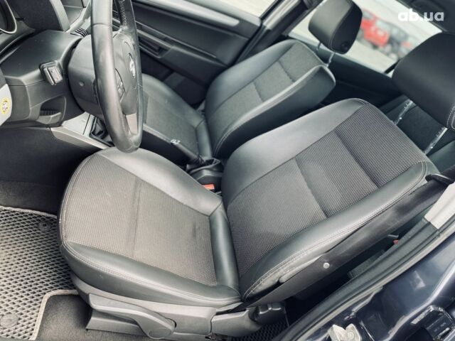 Серый Опель Астра, объемом двигателя 1.8 л и пробегом 231 тыс. км за 5400 $, фото 8 на Automoto.ua