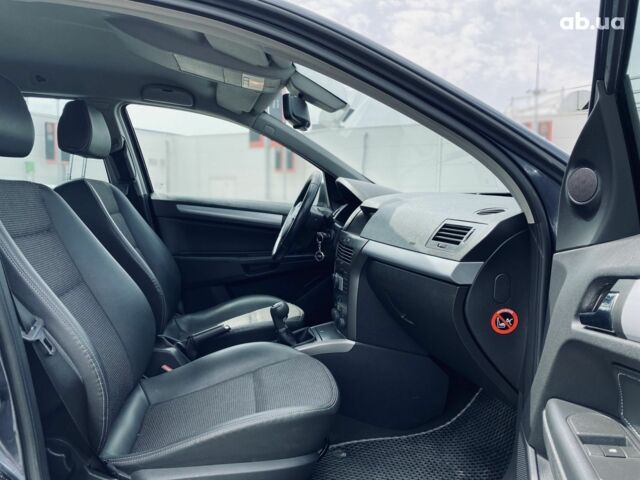 Серый Опель Астра, объемом двигателя 1.8 л и пробегом 231 тыс. км за 5400 $, фото 12 на Automoto.ua