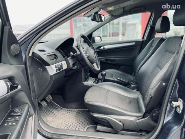 Серый Опель Астра, объемом двигателя 1.8 л и пробегом 231 тыс. км за 5400 $, фото 7 на Automoto.ua