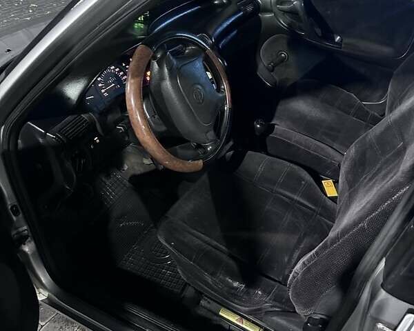 Серый Опель Астра, объемом двигателя 1.4 л и пробегом 274 тыс. км за 2500 $, фото 1 на Automoto.ua