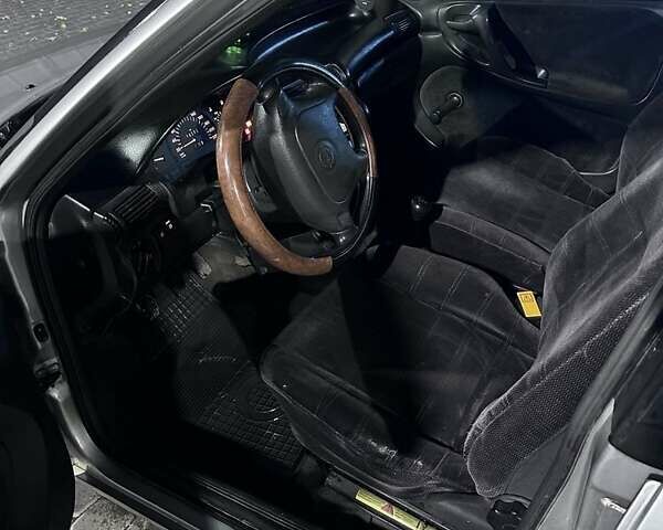 Серый Опель Астра, объемом двигателя 1.4 л и пробегом 274 тыс. км за 2500 $, фото 8 на Automoto.ua