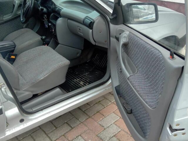 Серый Опель Астра, объемом двигателя 1.6 л и пробегом 350 тыс. км за 900 $, фото 3 на Automoto.ua