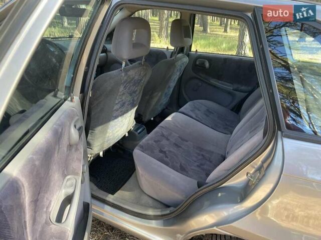 Серый Опель Астра, объемом двигателя 1.6 л и пробегом 320 тыс. км за 3000 $, фото 2 на Automoto.ua