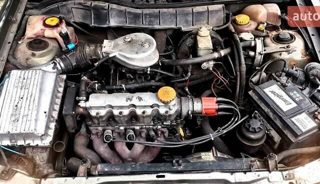 Серый Опель Астра, объемом двигателя 1.4 л и пробегом 280 тыс. км за 1350 $, фото 7 на Automoto.ua